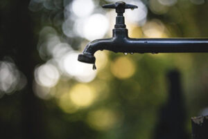 Low water pressure on a garden tap in your home.