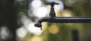 Low water pressure on a garden tap in your home.