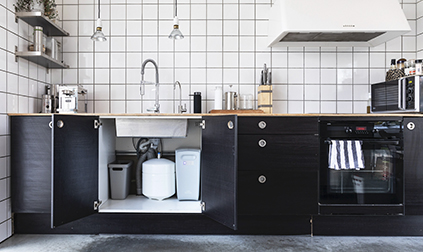 Under-sink space as the best location for a water treatment system.