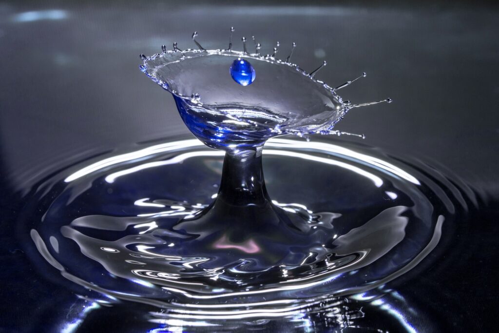 A drop of water in a blue glass