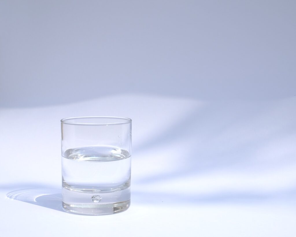 A glass on a kitchen counter